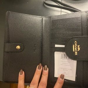 NWB coach wristlet black